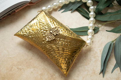 Tia Gold Brass Clutch