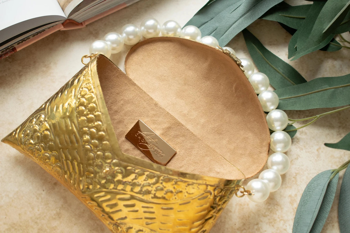 Tia Gold Brass Clutch