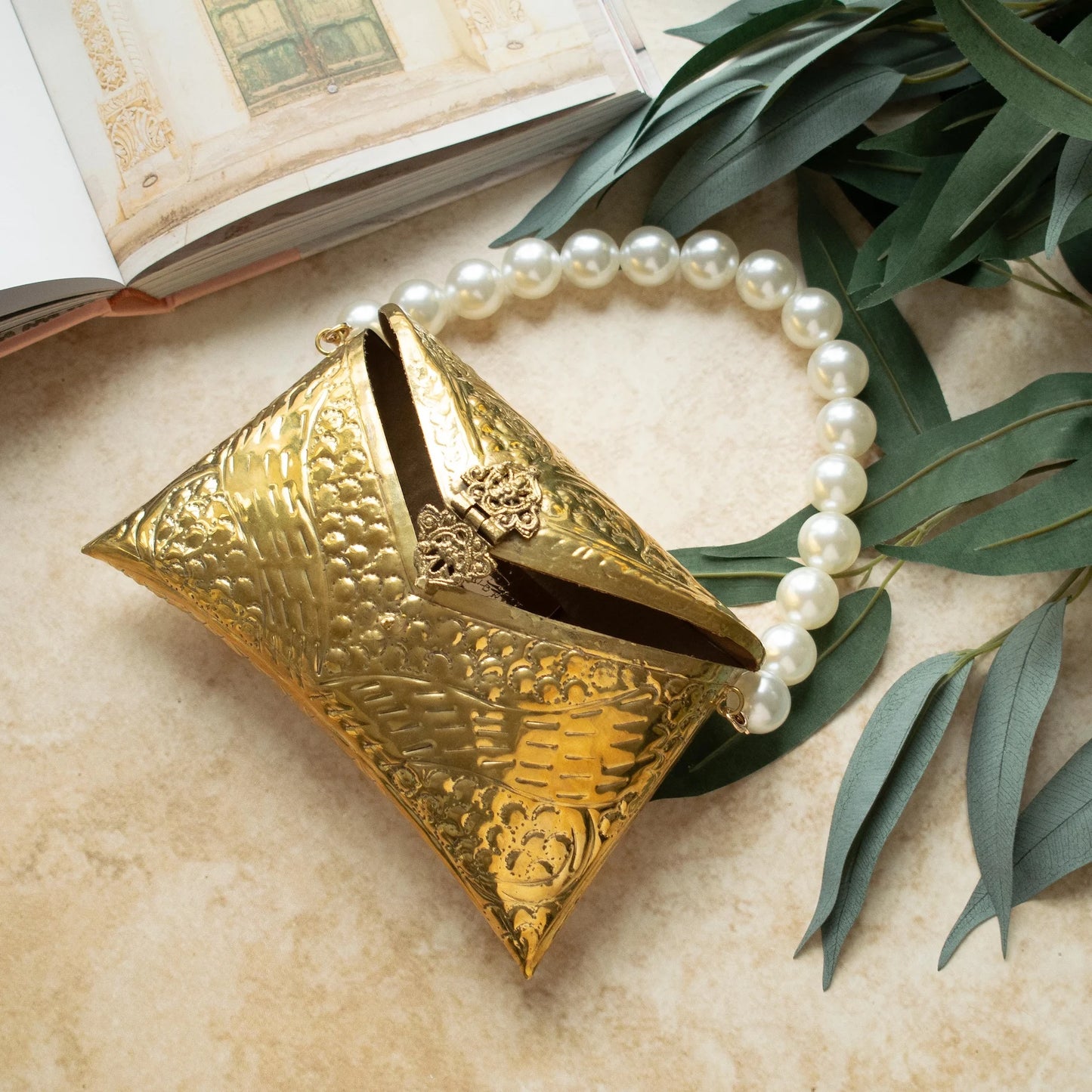 Tia Gold Brass Clutch