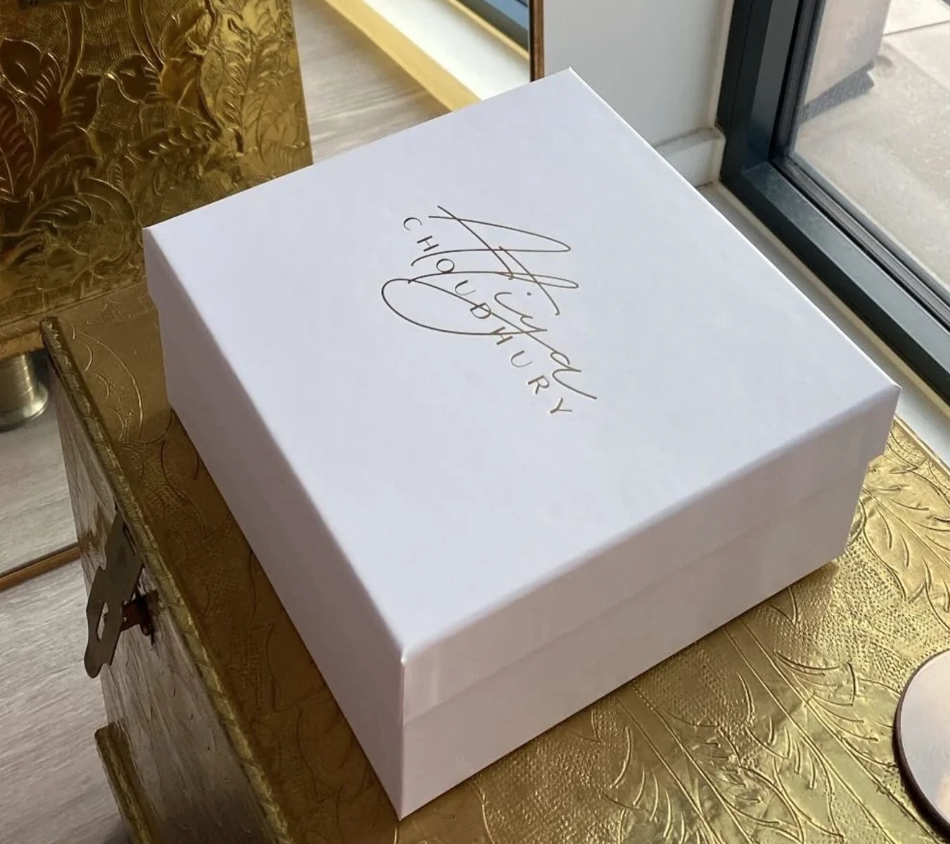 Tia Gold Brass Clutch