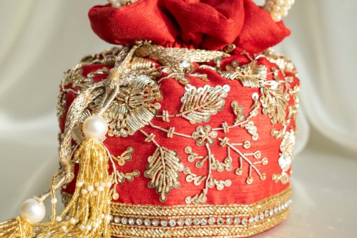 red silk with gold embroidery, indian bridal potli bag